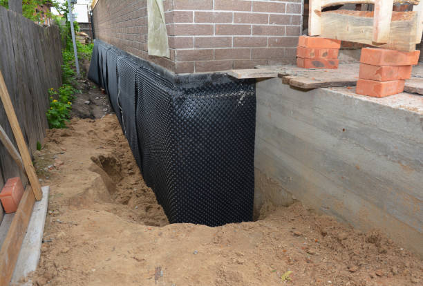 SJ Waterproofing Pros technician performing targeted Exterior Waterproofing assessment in Sterling, VA